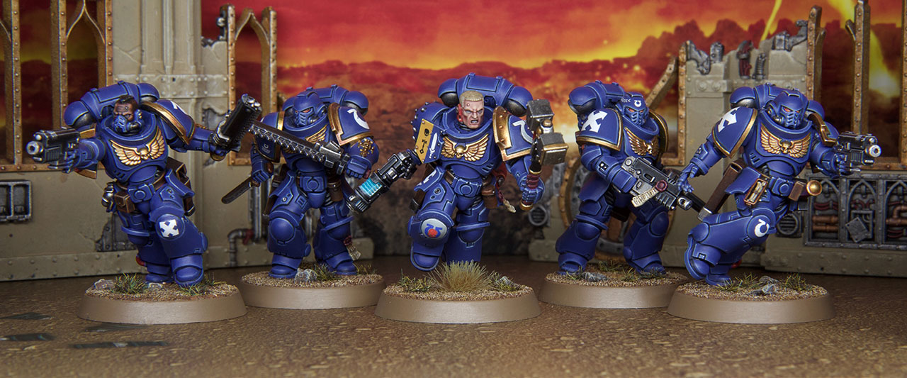 A squad of five space marines.